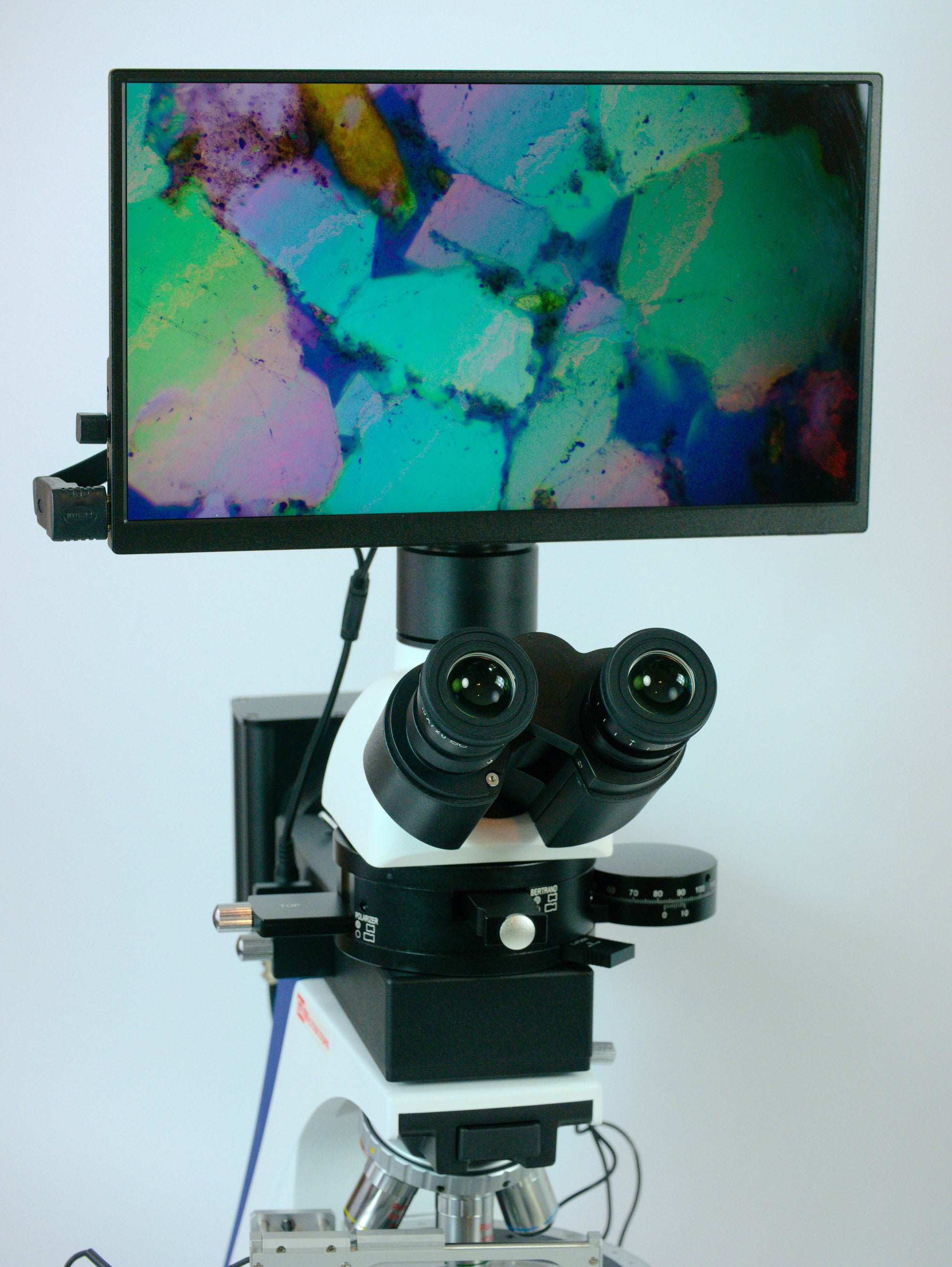 Polarising Microscope with Camera and Screen setup displaying polarised sand granules