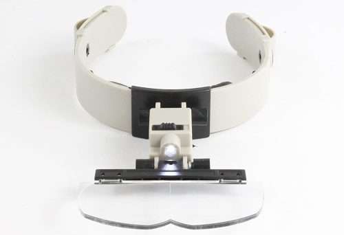 Head mounted magnifier